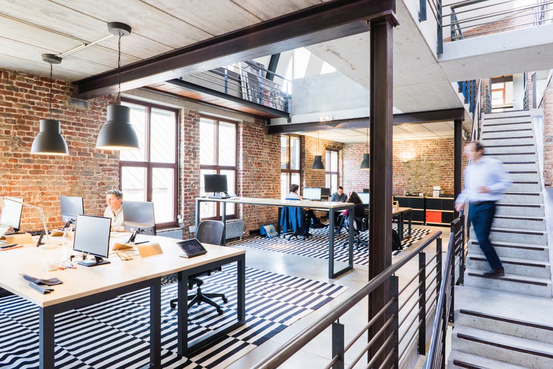 A busy workplace in an office building where contactless food delivery might be needed.