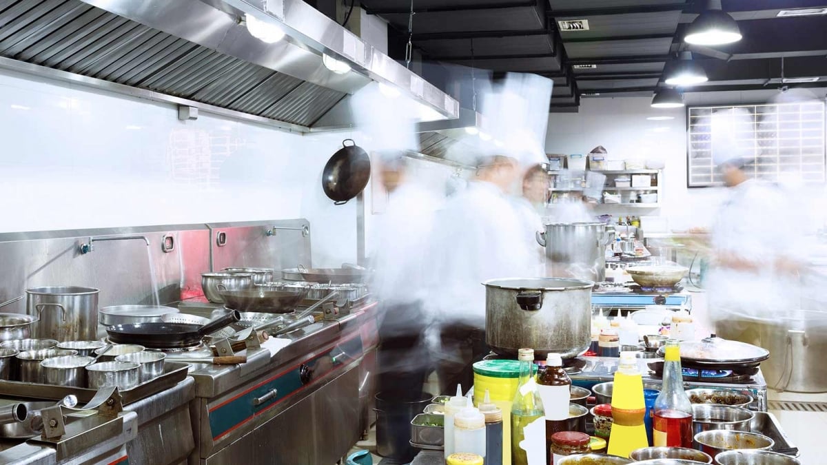 The inside of a busy restaurant kitchen.