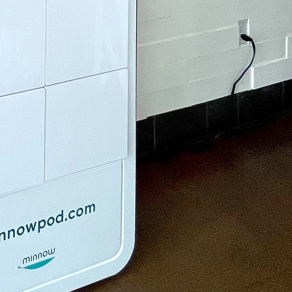 A food Pickup Pod plugged into the wall.