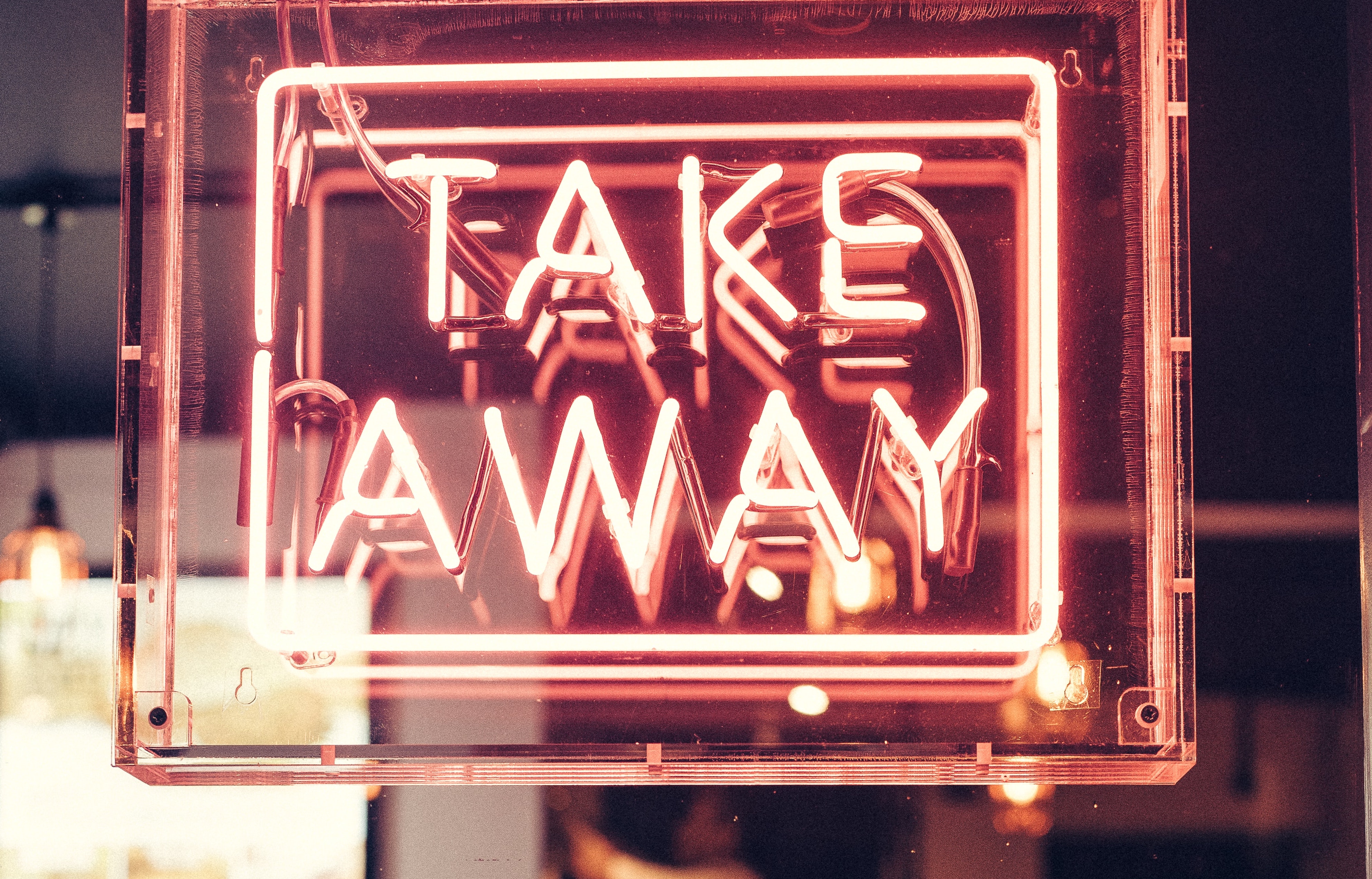 An electric sign that says Takeaway.